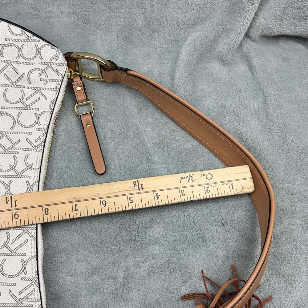 Calvin Klein Logo Print Hobo Bag in Cream and Brown